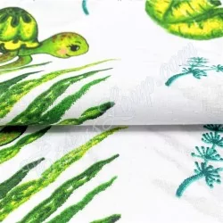Katoenen stof bedrukt met groene zeeschildpadden en planten | Wolf Stoffen